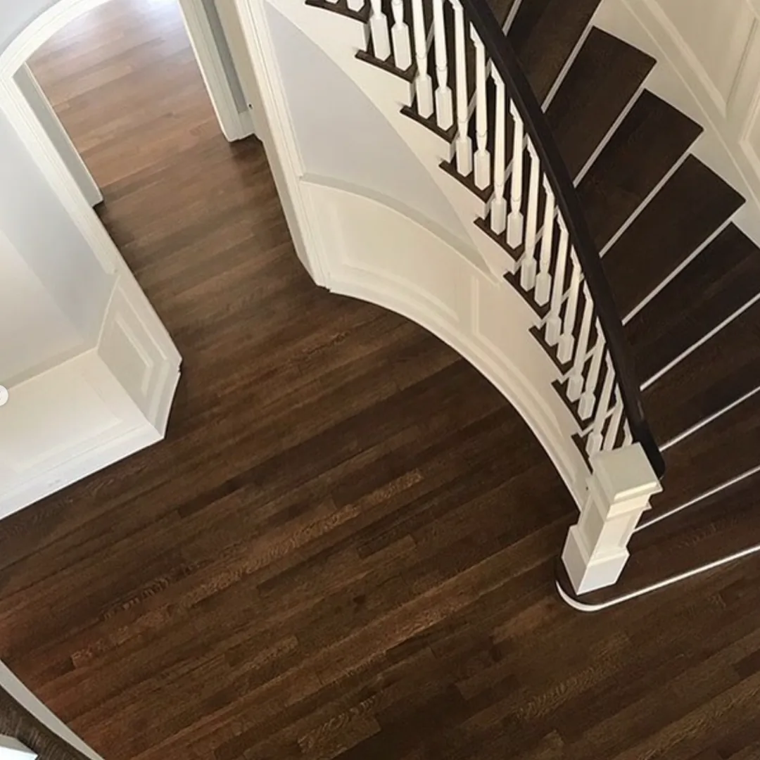 Dark hardwood floor and staircase