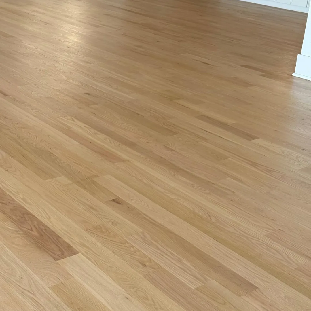 Close up of newly installed white oak plank flooring