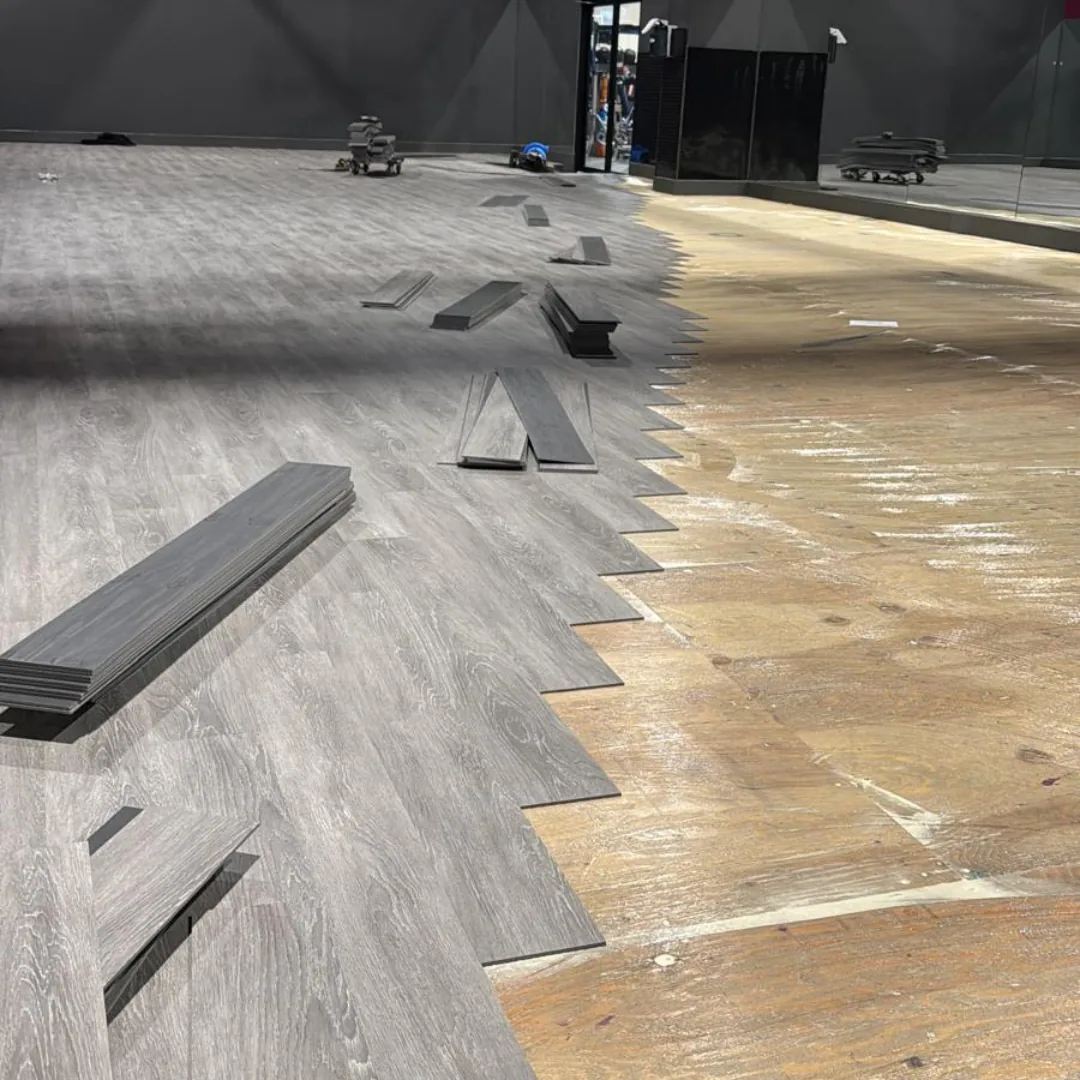 Vinyl plank flooring installation in progress